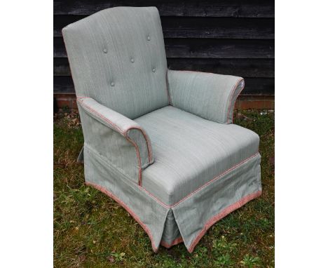 A button back bedroom chair, in green upholstery 
