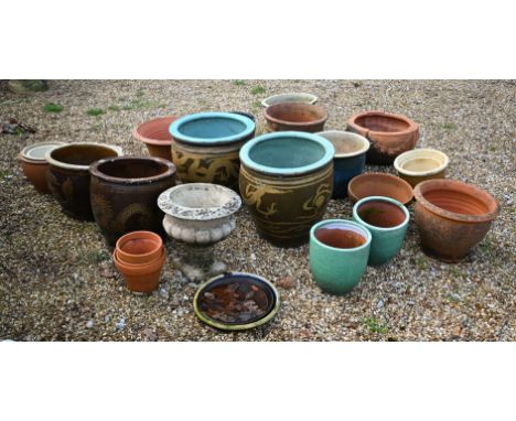 A pair of glazed dragon design garden planters to/with an assortment of other glazed and terracotta planter pots, some a/f, a