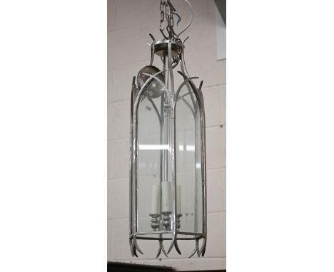 A large Gothic-style three light pendant lantern, with six lancet glass panels and suspension chain, 75 cm high 