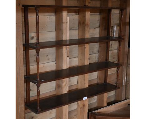 A mahogany four-tier spice rack with slender turned pillars, 90 cm wide x 74 cm high 