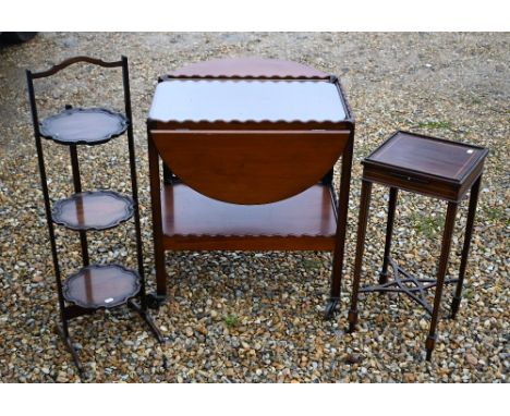 A vintage three-tier folding cake-stand to/with a traditional tea trolley and a Sheraton Revival gallery top night stand (3) 