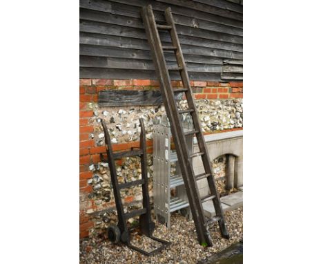 An aluminium folding four-fold ladder, to/with a vintage wooden ladder and a vintage sack-truck (3) 