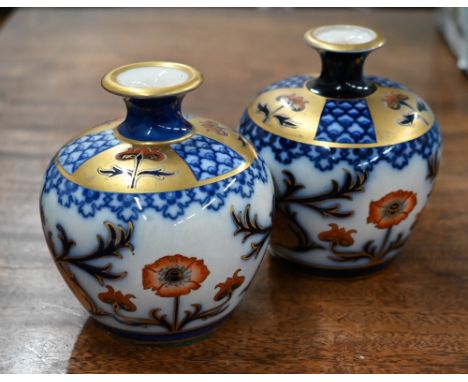 A near-matched pair of Edwardian Moorcroft MacIntyre Aurelian pattern small vases with Art Nouveau stylised floral decoration