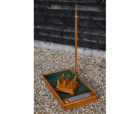 A vintage stained oak bar skittles game 