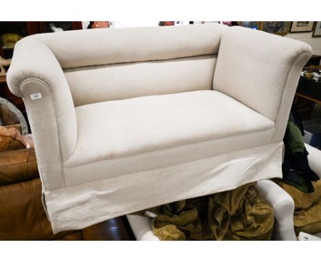 An Edwardian two seater sofa on tapering square supports and casters, cream linen fabric, 150 cm wide x 80 cm x 80 cm 