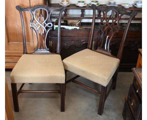 A set of six carved mahogany Chippendale style dining chairs with beige diamond-weave pattern upholstered seats (6) 