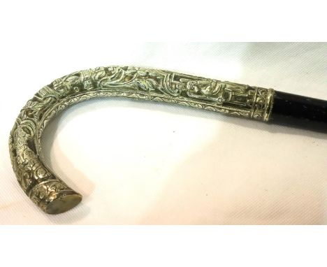 Ebonised walking stick with white metal handle featuring Oriental figures. Not available for in-house P&amp;P, contact Paul O