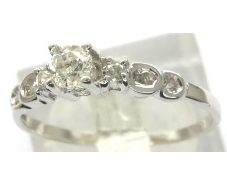 Contemporary 18ct white gold and diamond ring, size Q, 1.8g. P&amp;P Group 1 (£14+VAT for the first lot and £1+VAT for subseq