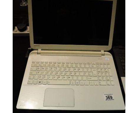 Toshiba Satellite LG150 with charger, operating system unknown, screen will not light up but does appear to power on. P&amp;P