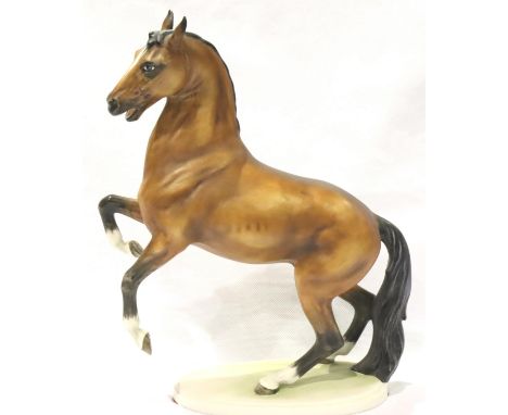 Goebel figurine of a chestnut and black coloured rearing horse, model number 309, dated 1969, H: 25 cm. P&amp;P Group 2 (£18+