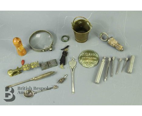 Miscellaneous Items - including a treen cotton holder, miniature brass bucket, bone nail pick, brass coin weight, brass plaqu