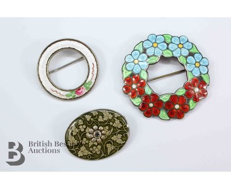 Three vintage enamel brooches, including a floral example circa 1945, white enamel circular scarf ring, Catherine Popesco bro