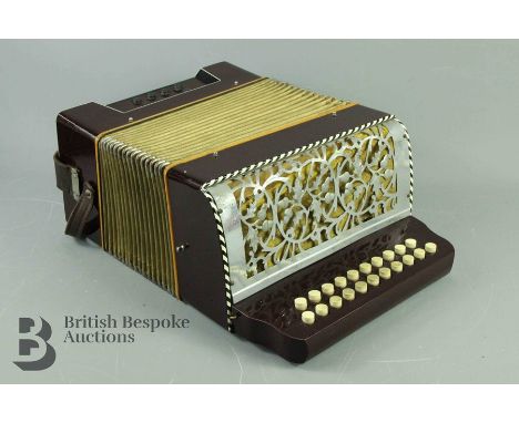 A vintage piano accordion, in the original box, not marked.
