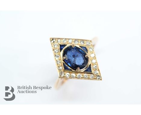 14/15ct gold sapphire and diamond ring, the midnight blue oval-cut sapphire measuring approx 7.5 x 5.8mm, surrounded by four 