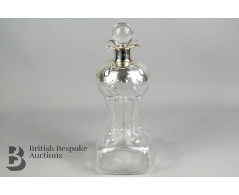 Early 20th century glug decanter, silver collar and shoulder, Birmingham hallmark dated 1906, mm William Hutton &amp; Sons, a