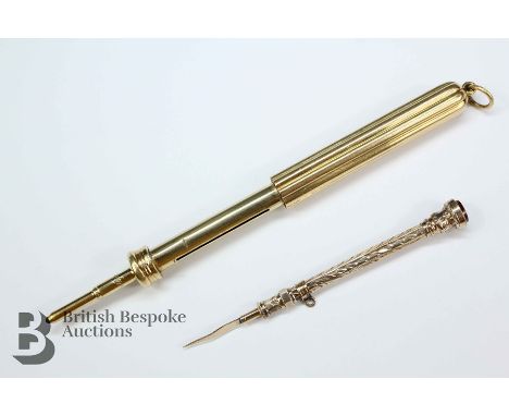 Metamorphic pen/pencil marked 18k (tested and confirmed) on the suspension ring, together with a 9ct gold toothpick set with 