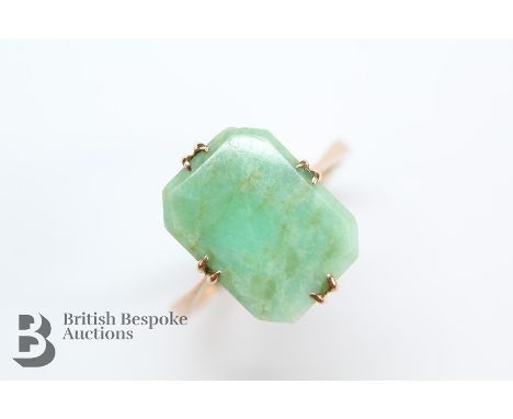 Early 20th century 9ct yellow gold and jade ring, the jade approx 12 x 8mm, size H, approx 2.2 gms.&nbsp;