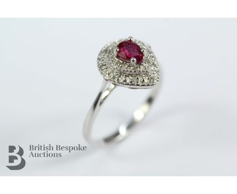 9ct white gold, ruby and diamond ring, the ruby approx 5.4 x 4 mm and approx 15 pts of eight-cut dias, size N, approx 2.6 gms