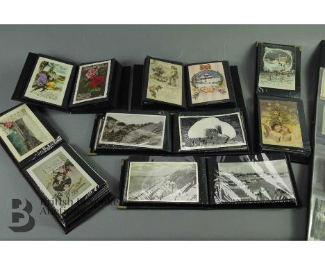 Vintage postcards, including a quantity of floral photographic postcards, charming early 20th century birthday postcards, an 