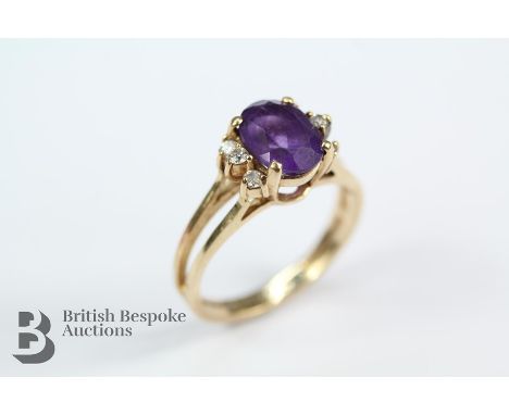 14ct yellow gold and amethyst ring, approx 8 x 6mm, approx 12 pts of dias, size J, approx 2.7 gms.