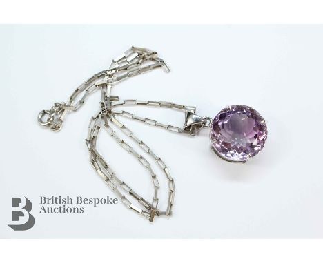 9ct white gold and amethyst pendant, suspended on a fine silver chain, approx 42 cms l, the amethyst approx 17mm d, approx 12