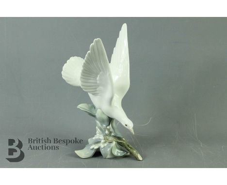 Lladro Figurine - White Turtle Dove approx 29 x 25 cms, with blue factory marks to base.