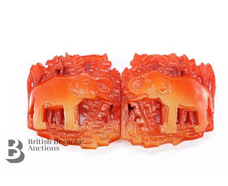 A vintage buckle, carved with elephant motif, approx 11 cms w x 5 cms h.