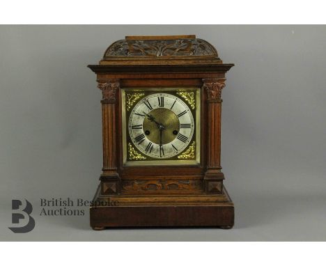 Oak Cased Mantel Clock, brass face with Roman dial, brass spandrels, approx 29 x 18 x 39 cms, Westminster chime (evidence of 