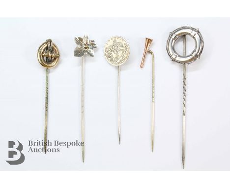 Miscellaneous silver head tie pins, including silver coin, ivy-leaf, life buoy, 9ct gold hunting horn and one with rope desig