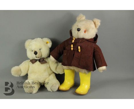 Steiff Teddy Bear, approx 45 cms, nr 0322/04 together with a Paddington bear, smartly dressed in yellow wellies and a brown t