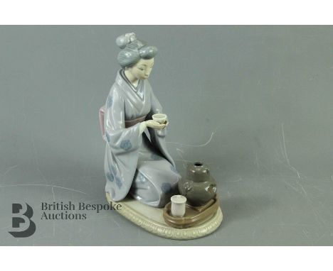 Lladro Figurine - Tea Ceremony, approx 34 cms h, with blue factory marks to base.