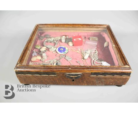 Small countertop jewellery display case, containing various silver jewellery and other items, brooches, moonstone pill box, e