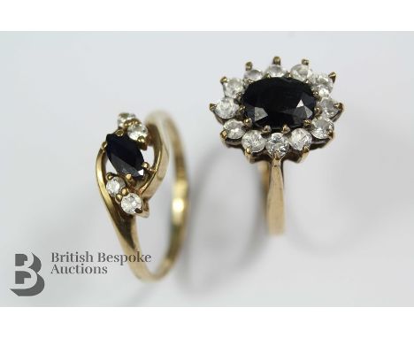 Two 9ct gold rings. The first a sapphire and white stone ring set with a marquise-cut sapphire approx 6 x 3 mm&nbsp; with fou