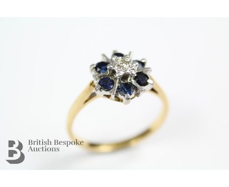 18ct yellow gold sapphire and diamond ring, the ring set with six circular sapphires approx 2.5mm each and a single diamond a