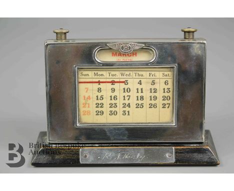 Bentley Motors perpetual desk calendar, the silver frame Birmingham hallmark, dated 1929, mm W J Myatt &amp; Co, mounted on w