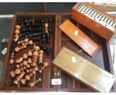A folding chessboard, dominoes and cribbage board