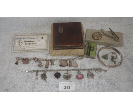 Two silver charm bracelets, a silver bangle and a collection of other jewellery including a loose oval-cut sapphire