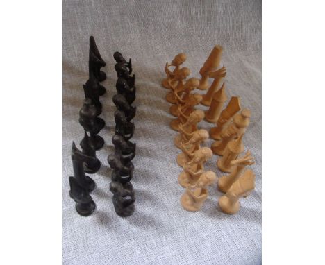 Makonde Tribe: A series of light wood and dark wood figural chess pieces