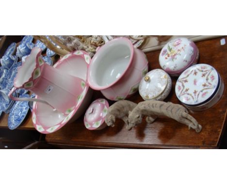 An Edwardian jug and bowl with matching chamber pot and soap dish, three similar ceramic powder bowls and two ceramic tigers
