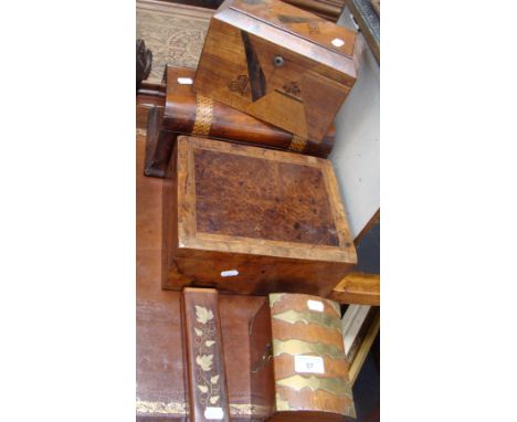 A Victorian walnut and parquetry inlaid tea caddy and a collection of similar boxes