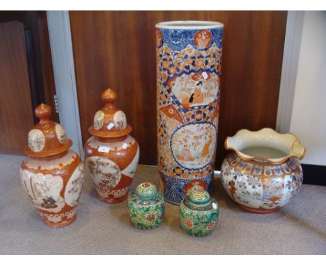 A pair of Japanese jars with covers, decorated with figures in traditional costume, a pair of Oriental ginger jars, an Imari 