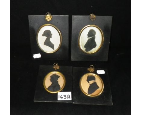 Four 19th century portrait silhouettes