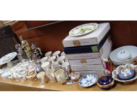 A quantity of collectors plates, commemorative mugs, Royal Worcester miniature jugs, ceramics and similar items
