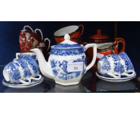 A Staffordshire 'Willow' pattern design pot with cups and saucers of small proportions and a collection of Japanese teaware