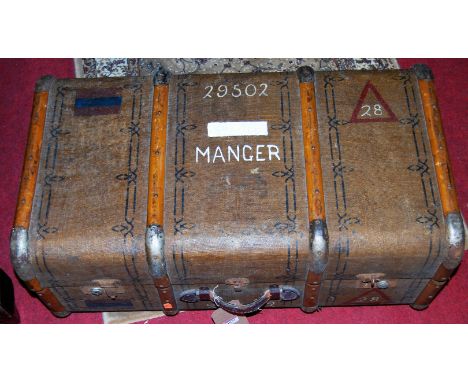 A canvas bound shipping trunk