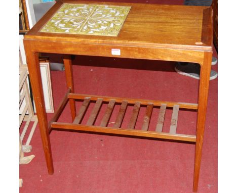 A 1970s teak and tile top inset rectangular side table, having laddered undertier, w.71cm