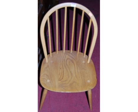 An Ercol light elm stickback single kitchen chair, together with a set of three contemporary beech barback kitchen chairs (4)