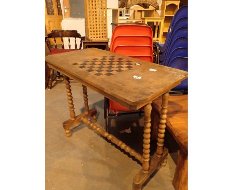 Vintage games table with inlaid chess board with bobbin turned legs and stretcher L: 90 cm