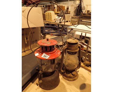 Three vintage hurricane lamps