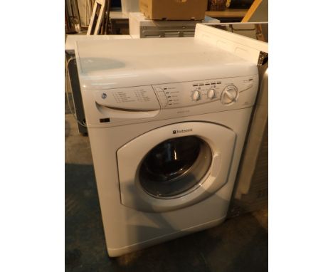 Hotpoint 1400 spin washing machine CONDITION REPORT: The item looks clean and still has the guarantee sticker to the front wh